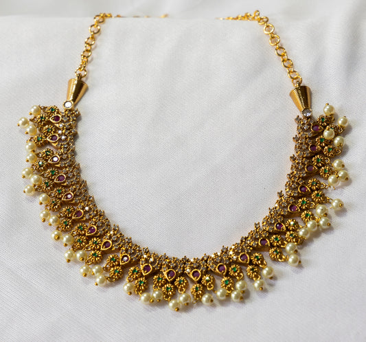 gold pearl necklace and earring set